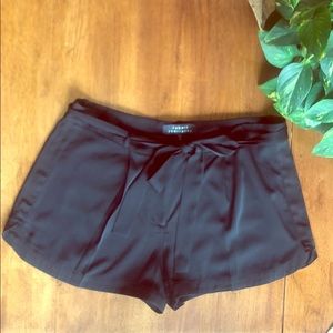 Robert Rodriguez black silk shorts.